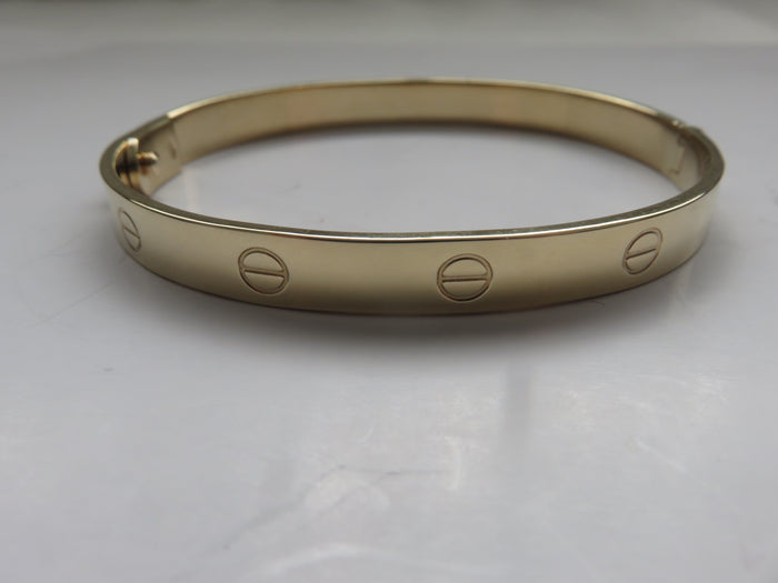 Gold screw online bracelet